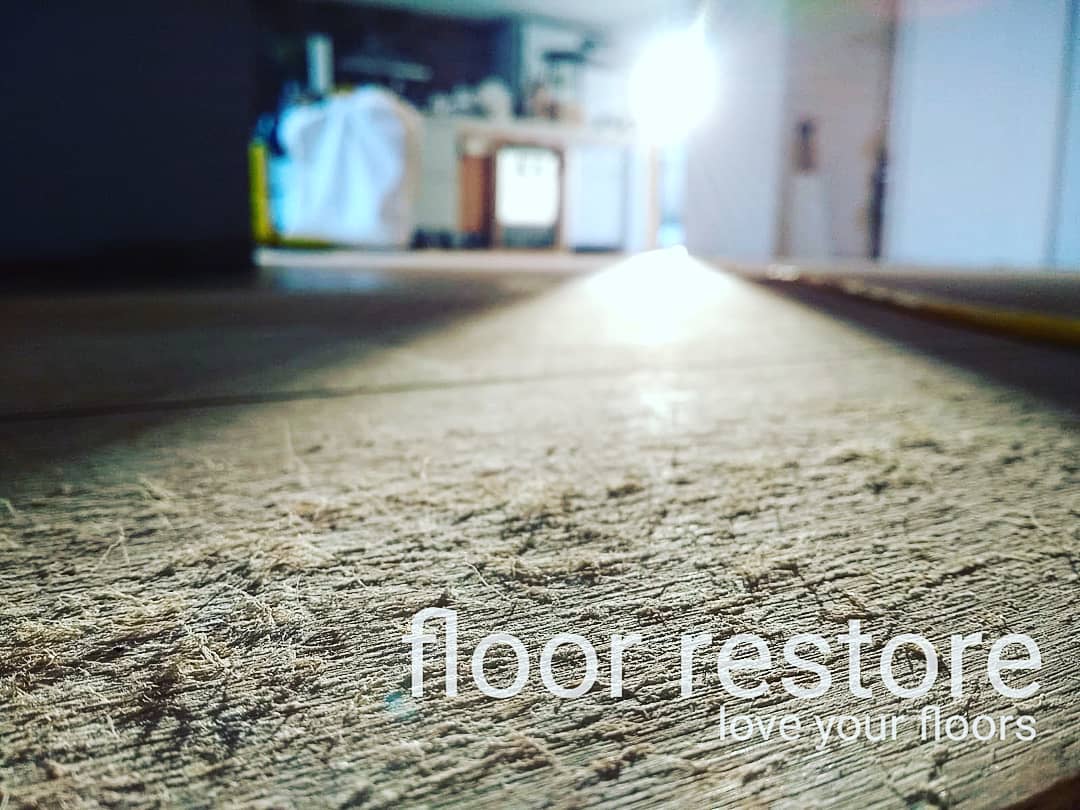 A floor in desperate need of sanding & restoration